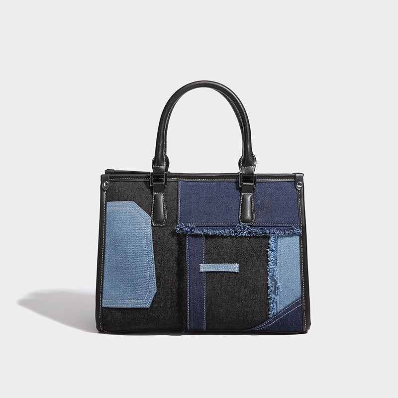 Stylish handbag featuring patchwork denim in black and blue for the 2025 Fall Series.
