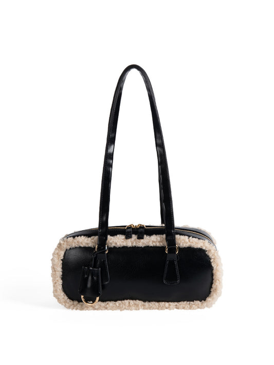 Stylish 2025 Fall Series Baguette Bag with soft lamb wool exterior and sleek black design.