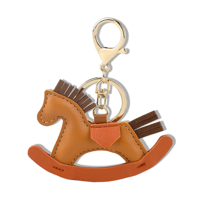 Expertly handcrafted, this adorable and charming leather pony bag pendant can catch everyone's eye.