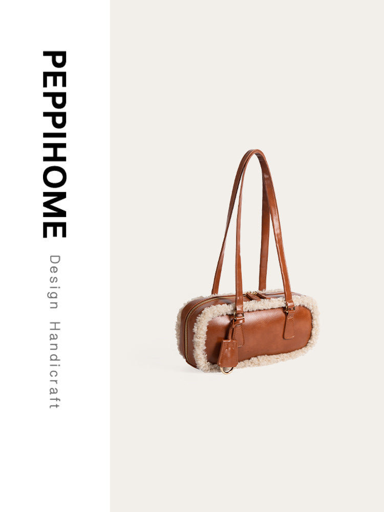 2025 Fall Series Baguette Bag in warm lamb wool, stylish accessory for autumn and winter outfits.