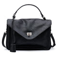 classic elegance tote bag in black leather with a sleek design and adjustable strap.