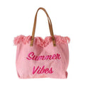 2026 Spring-Summer Series Straw Tote Bag with vibrant pink colors and fringed detailing, perfect for summer outings.
