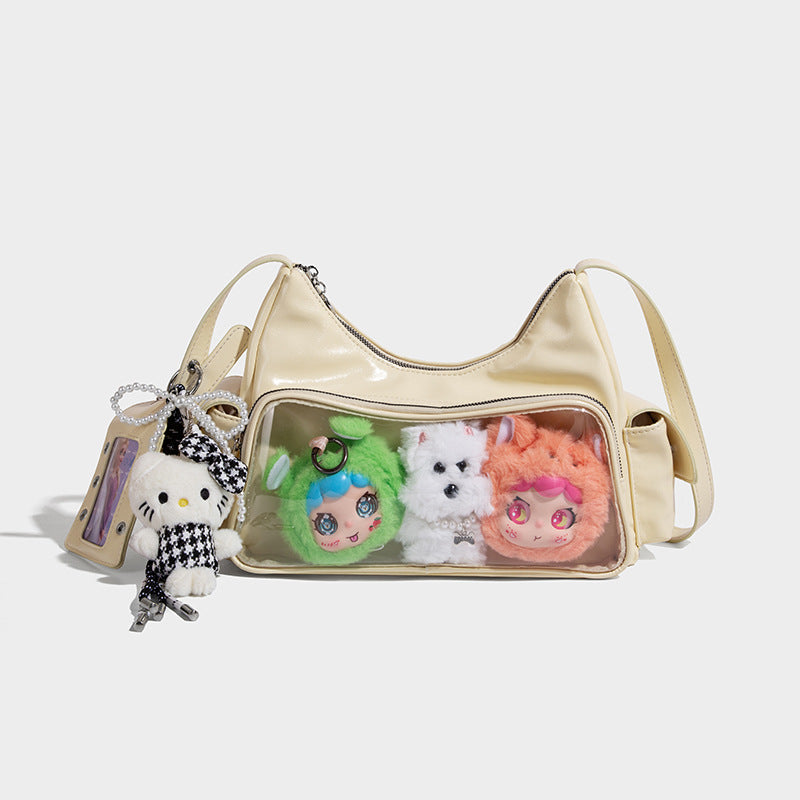 anime-inspired tote bag featuring cute plush toys inside a stylish clear compartment.