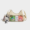 anime-inspired tote bag featuring cute plush toys inside a stylish clear compartment.