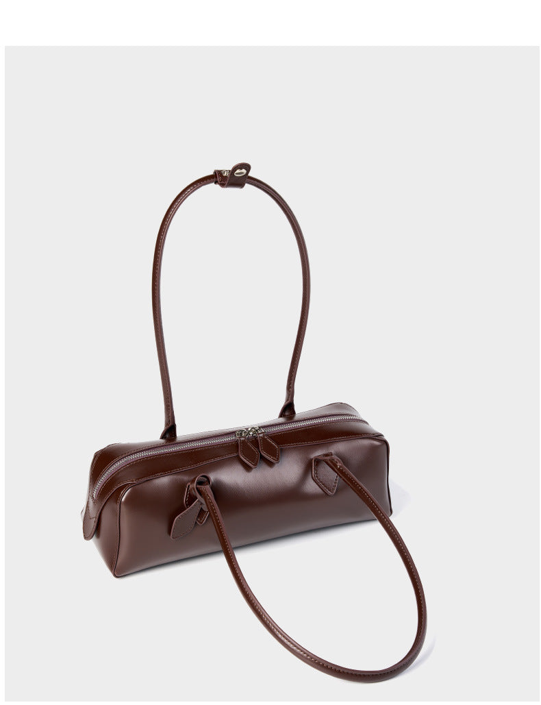 2025 Winter Leather Baguette Bag in brown leather, showcasing a stylish design and structured silhouette.