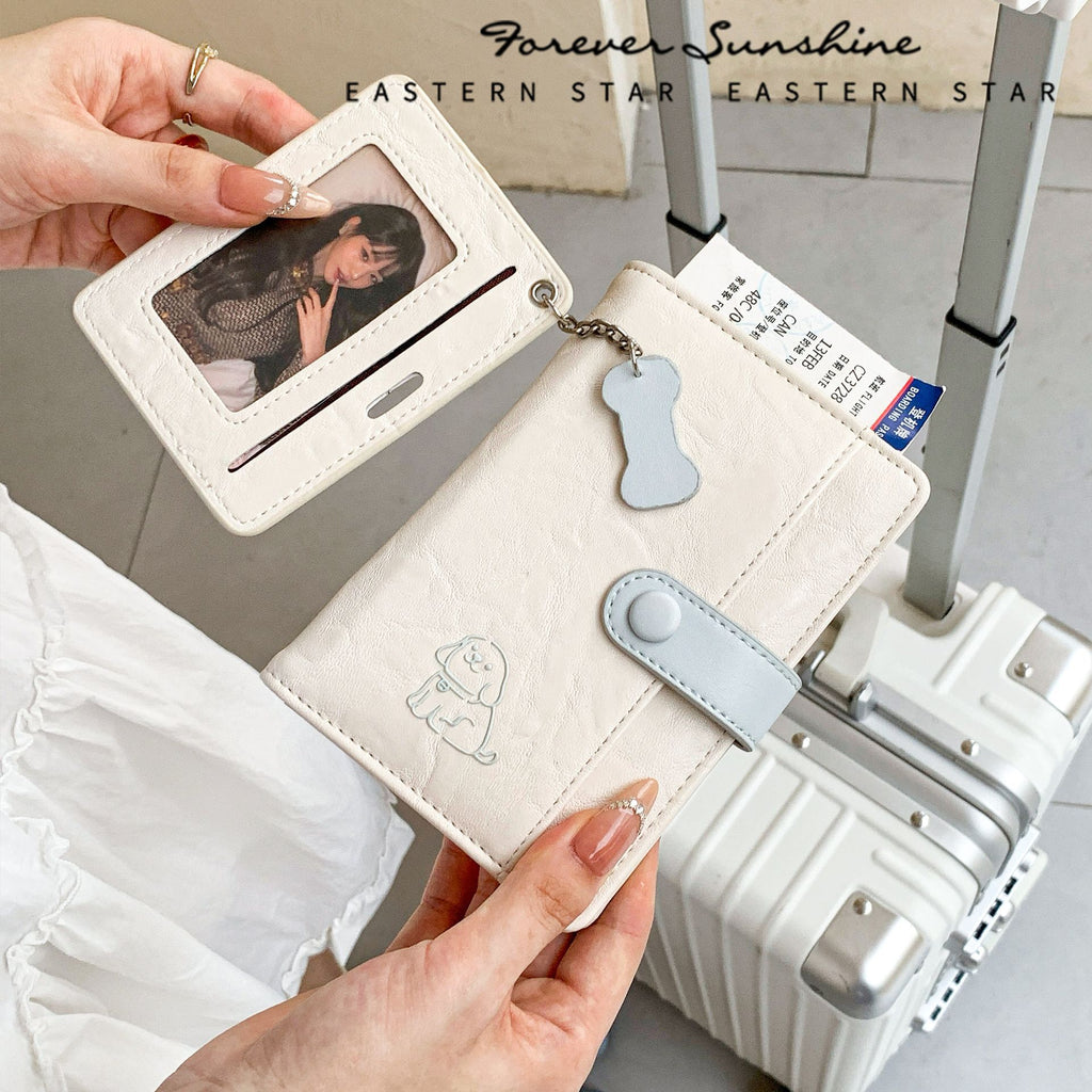 puppy passport holder and wallet featuring card slots and a charming puppy design, ideal for travel organization.