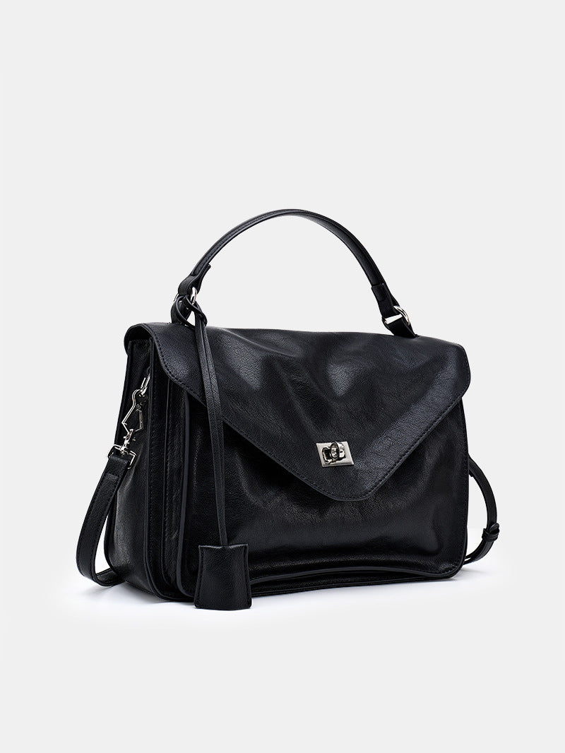 classic elegance tote bag 2025 - stylish black handbag with versatile carrying options and sleek design.
