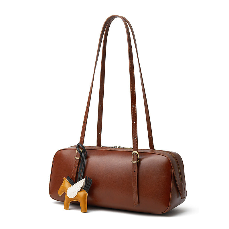 leather bowling handbag Dreamland Series in brown leather with decorative charm
