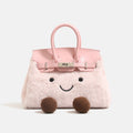 woolen handbag for winter with cute face and brown accents, perfect for chilly seasons.