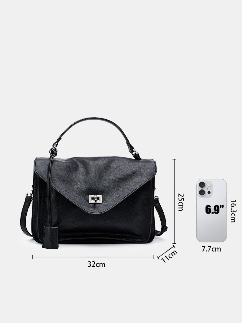 classic elegance tote bag dimensions with a smartphone for scale placement.