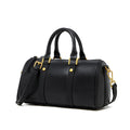 leather vintage boston bag in black with gold accents and detachable strap