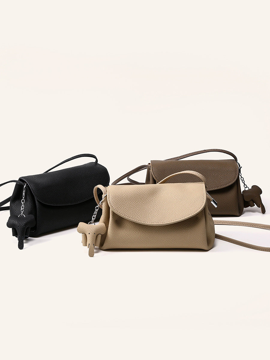 Mini Soft Cowhide Leather Bag in black and beige, showcasing soft leather texture and stylish design.
