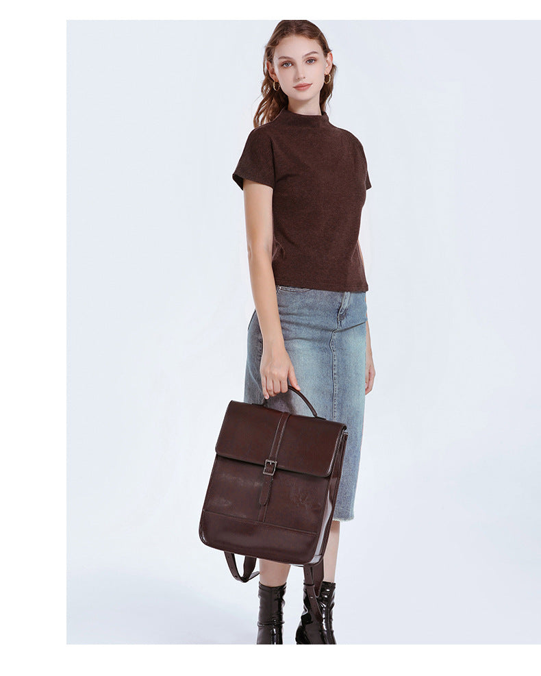 2025 Old School Classic Leather Ultra-Large Capacity Backpack worn by a model with a casual outfit.